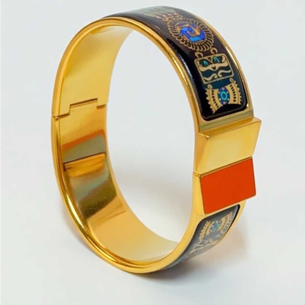 Hermès enamel bangle bracelet in black and gold plated metal- include box
